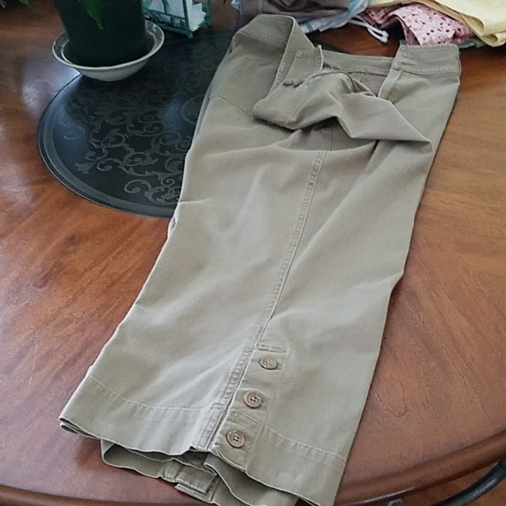 Buttons on leg.